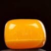 Oranje calciet gepolijst uit Mexico van circa 7x7cm