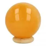 Oranje calciet bol van 4cm doorsnede met houten ringetje