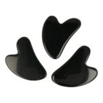 Zwarte obsidiaan Gua Sha of gezichtschraper