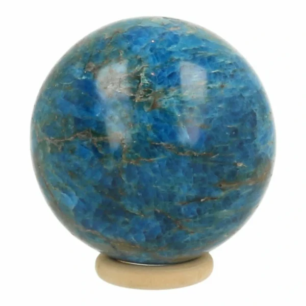 Prachtige blauwe apatiet bol met een diameter van 6cm op houten ring
