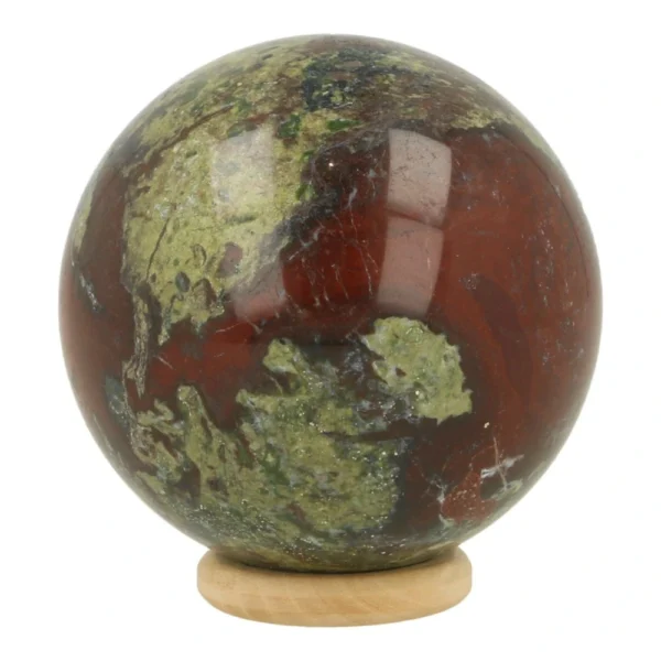Fraaie drakenbloedsteen bol met diameter van 57mm op houten ring