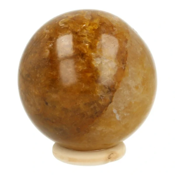 Mooie donkere gele golden healer bol met diameter van 64mm op houten ring