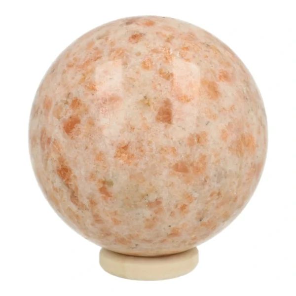 Fijne heldere zonnesteen bol met diameter van 58mm op houten ring