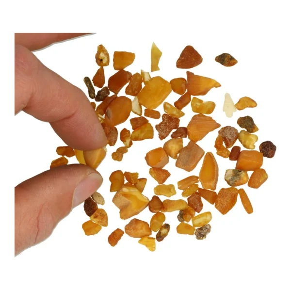 Mooie fijne stukjes barnsteen ruw van 5-15mm lang in zakje van 20 gram
