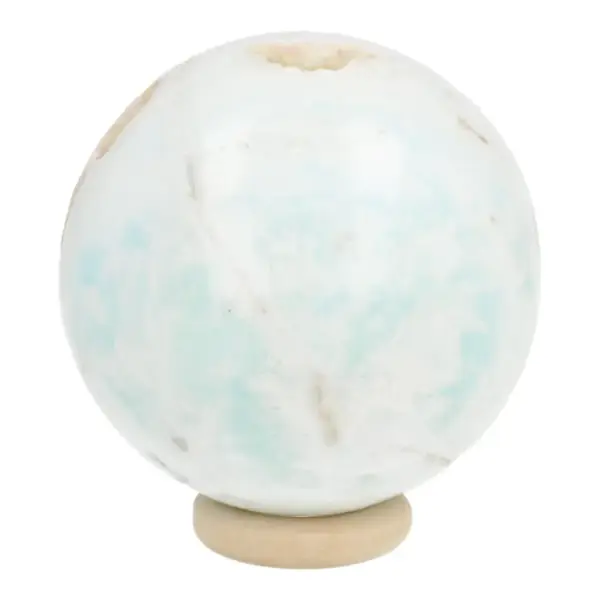 Bijzondere carribean blue calciet bol met diameter van 53mm op houten ring