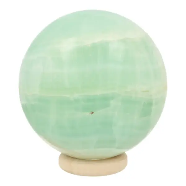 Fraaie frisgroene pistache calciet bol van 53mm diameter op houten ring