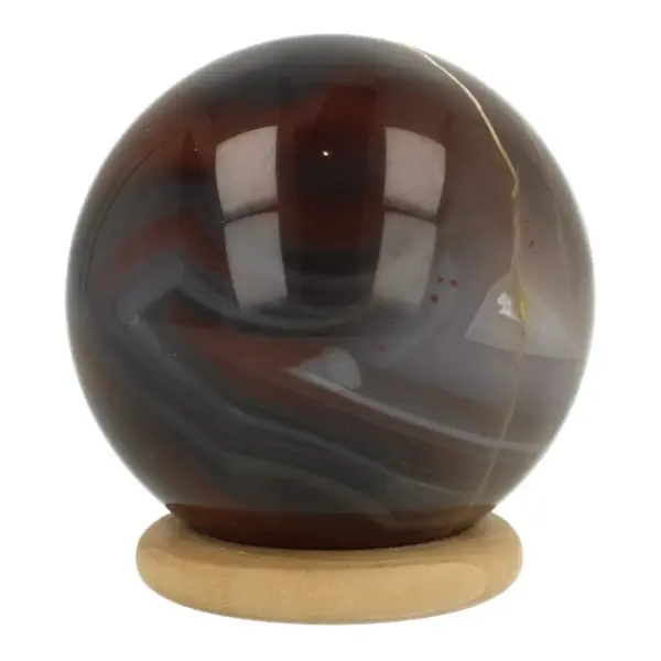 Fraaie Botswana agaat bol met diameter van 45mm op houten ring