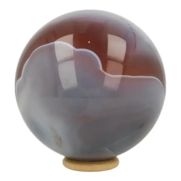 Zeer fraaie Botswana agaat bol met diameter van 87mm op houten ring