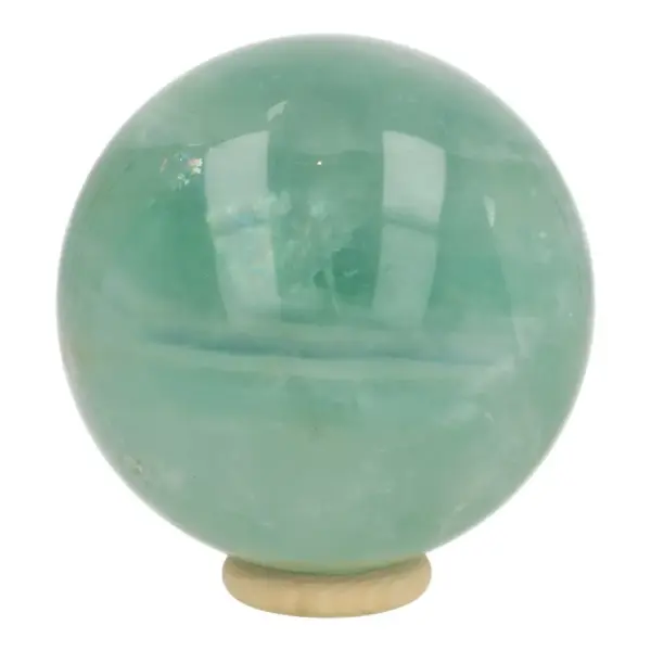 Leuke frisgroene fluoriet bol met diameter van 73mm op houten ring