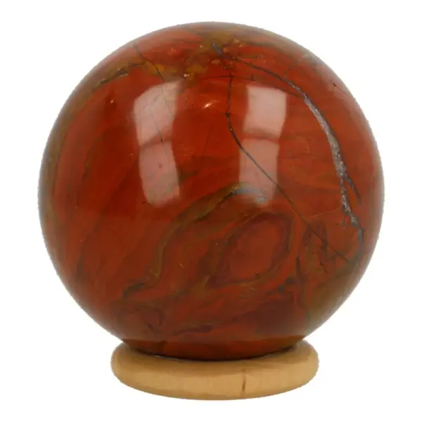 Mooie rode jaspis bol met diameter van 55mm op houten ring
