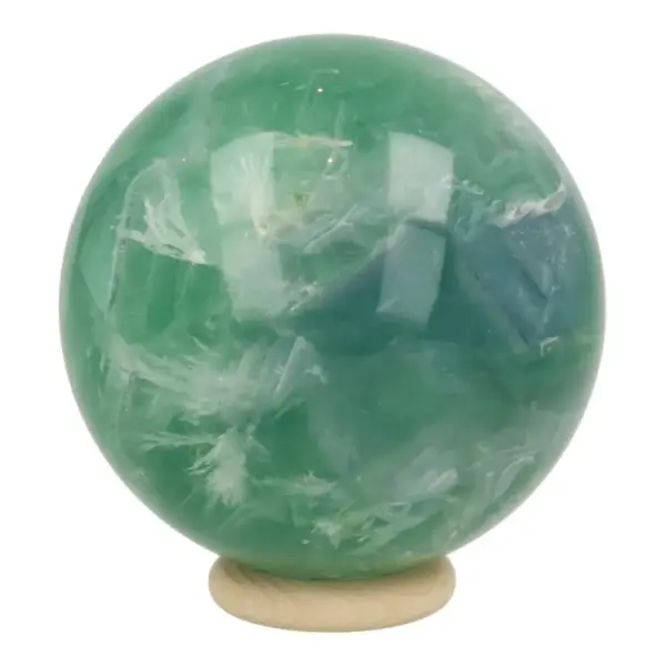 Mooie groene fluoriet bol met diameter van 63mm op houten ring